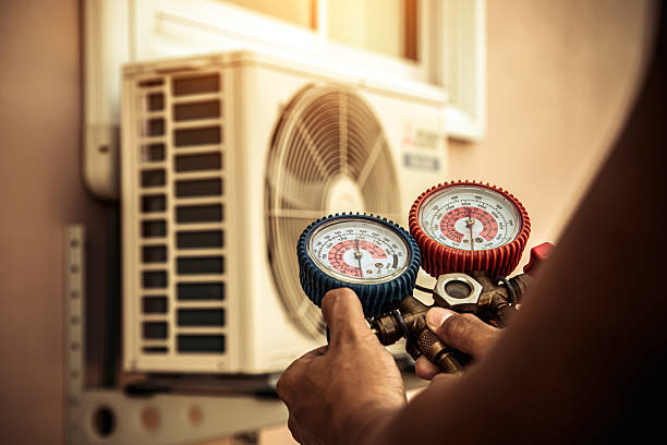 Professional Hvac technician working in Statham, GA